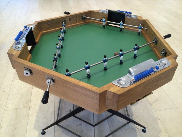 Triangular foosball table